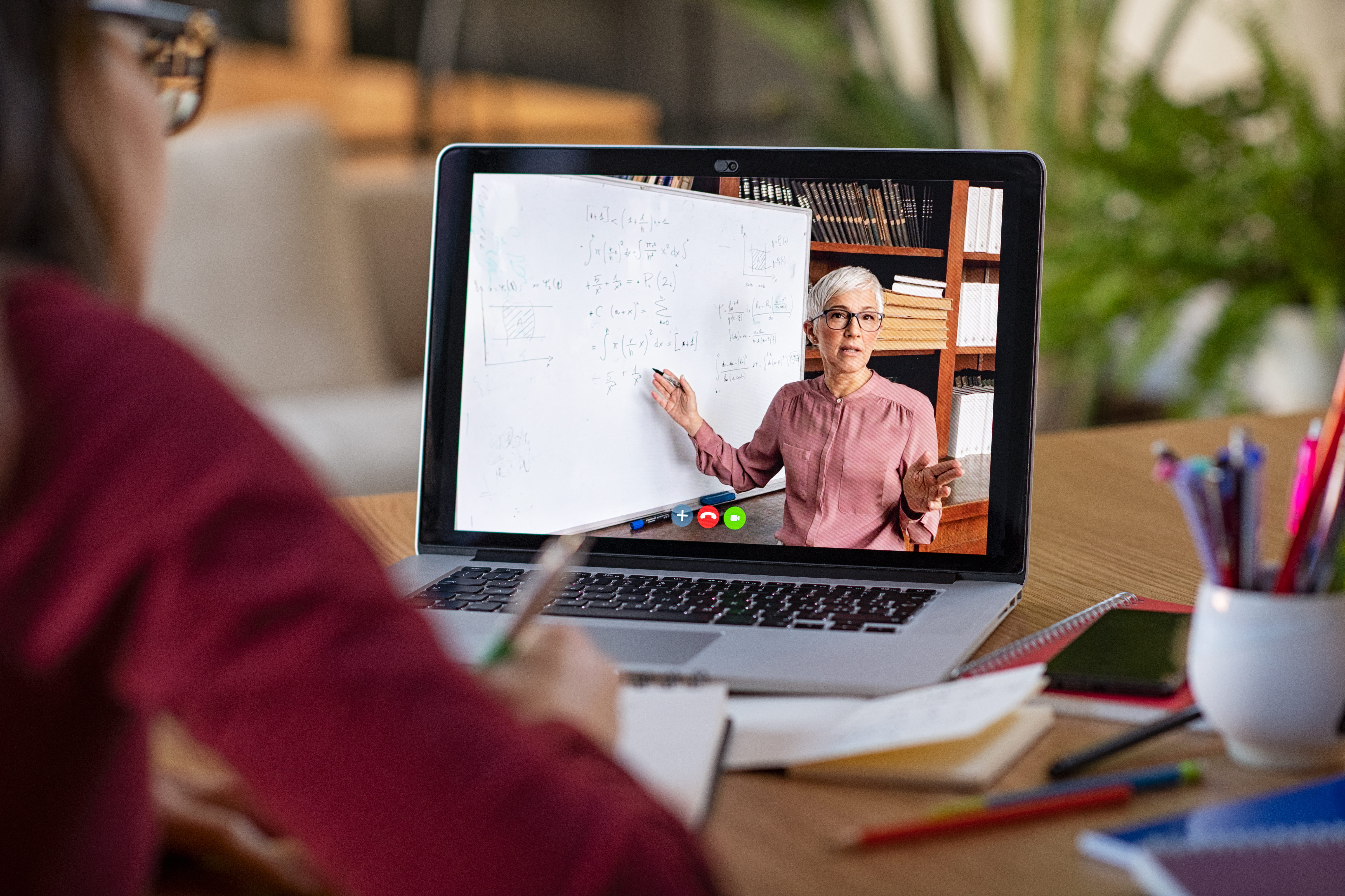 woman watching training on laptop